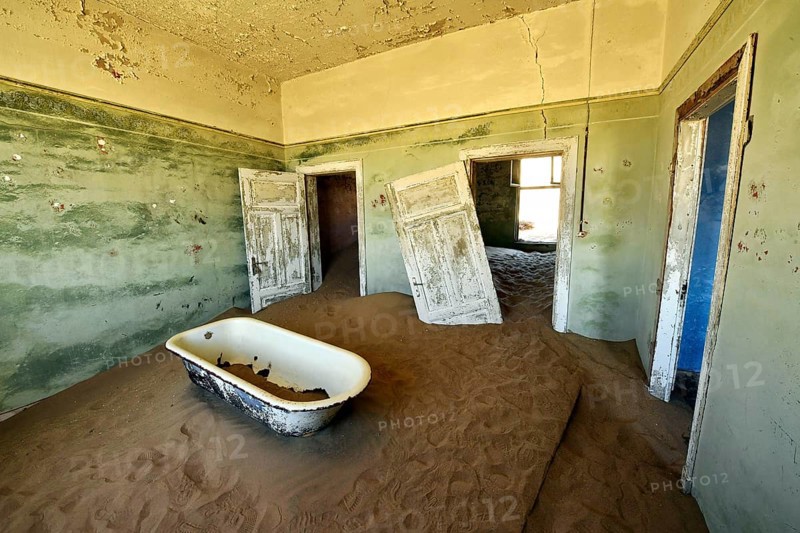 Desert sand in the ruined building of the former diamond city