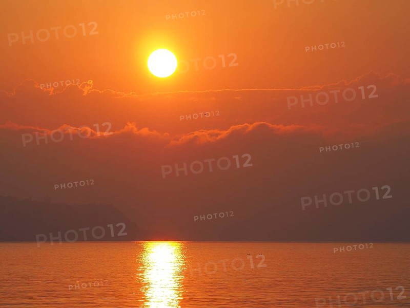 Sunrise over the sea in front of Ischia Ponte