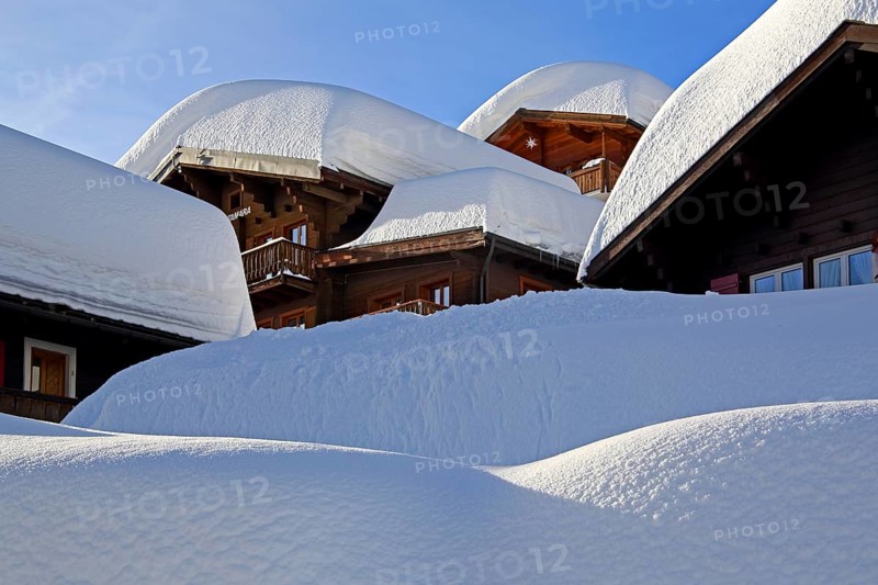 Chalets with deep snow in the village