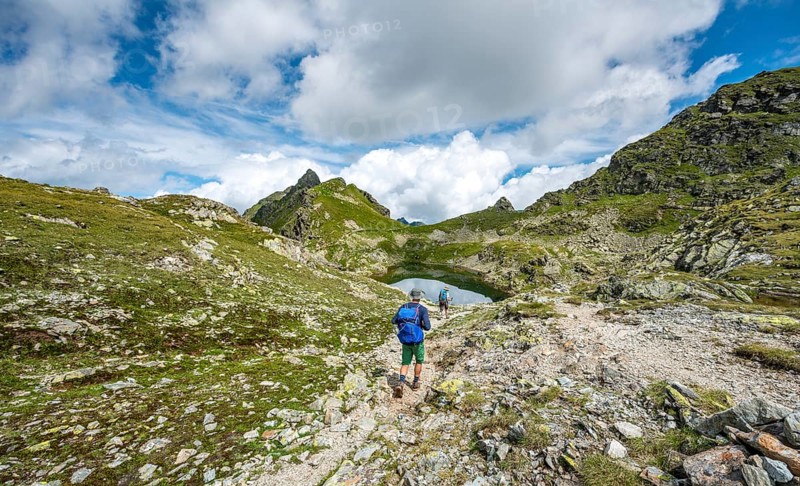 Hikers at small lakes in the Klafferkessel