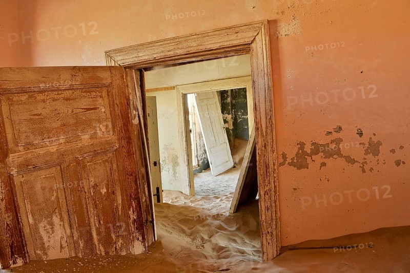 Desert sand in the ruined building of the former diamond city