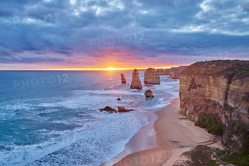 Rocky coast with the Twelve Apostles at sunset