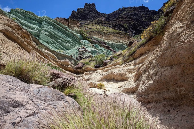 Turquoise colored rock layer Los Azulejos De Veneguera