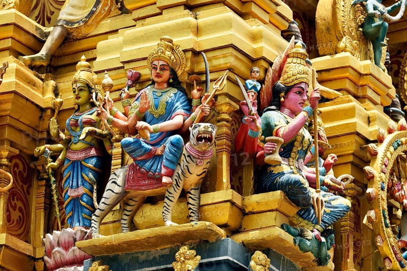 Colorful Hindu temple decorated with figures and gods