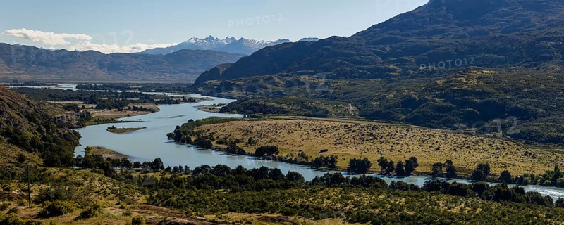 Rio Baker glacier river with the mountains of the Andes