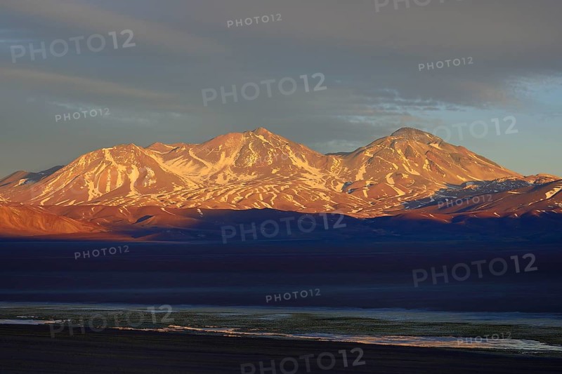 Volcano Nevado Tres Cruces at sunset
