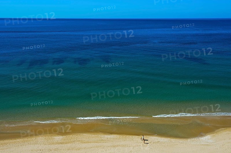 Empty sandy beach on the Algarve coast near Praia da Luz