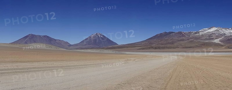 Runway on the Altiplano with volcano Licancabur
