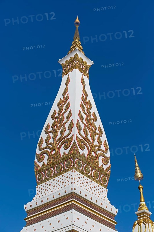 Lace of Chedi Wat Phra That Phanom decorated with golden ornaments
