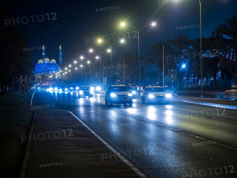 Traffic in front of illuminated Mohammed Al Ameen Mosque