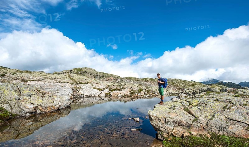 Hiker at a small lake