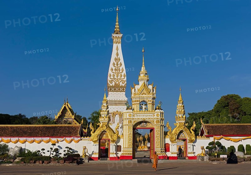 Monk in front of Chedi of Wat Phra That Phanom