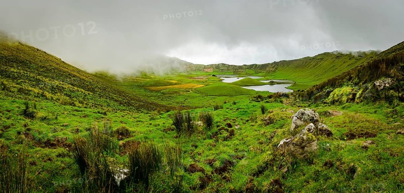 Crater of Caldeirao Volcano im mist