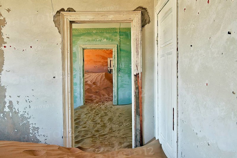 Desert sand in the ruined building of the former diamond city