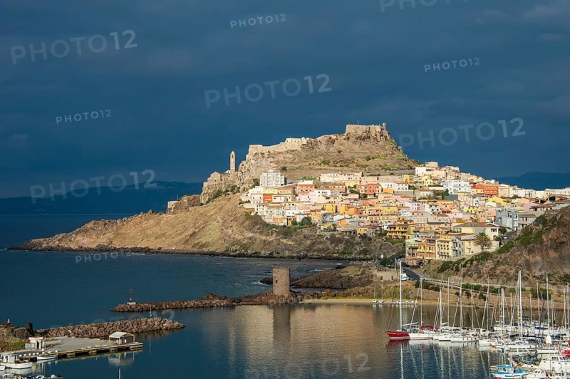 Dramatic light over the old town of Castelsardo with its boat harbour