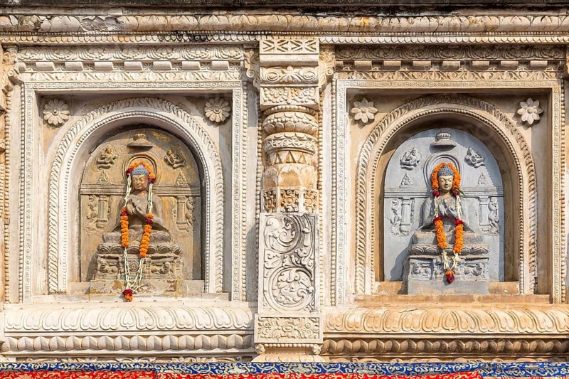 Buddha sculptures in the facade of the Mahabodhi Temple