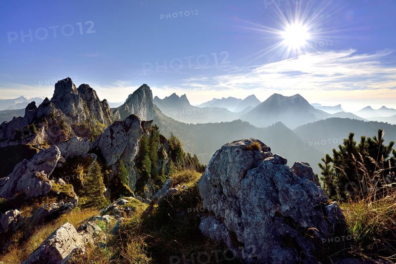 Sun star over Fribourg Pre-Alps