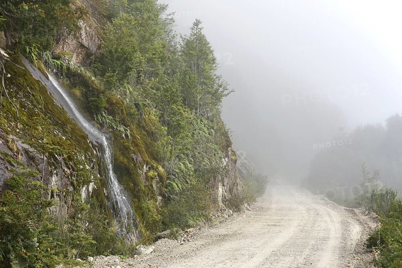 Gravel road in fog at Puerto Rio Tranquilo