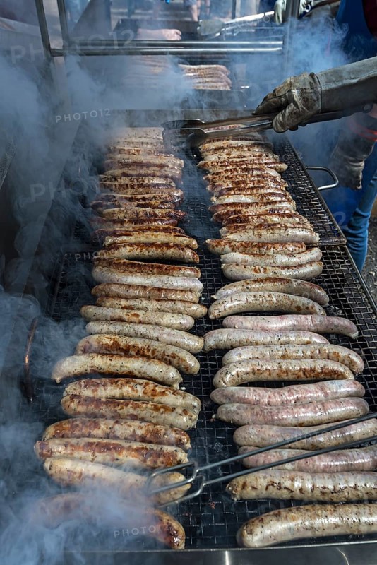 Grilled sausages at an oven party