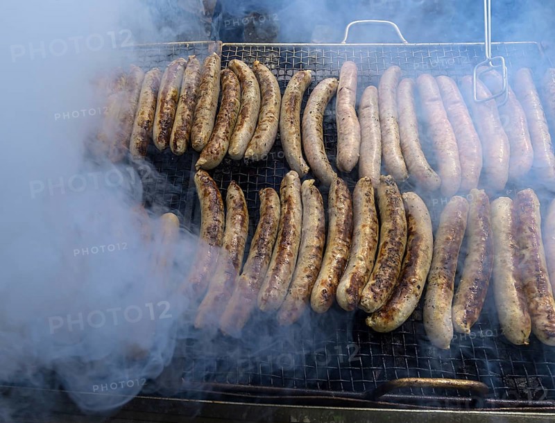 Grilled sausages wrapped in smoke