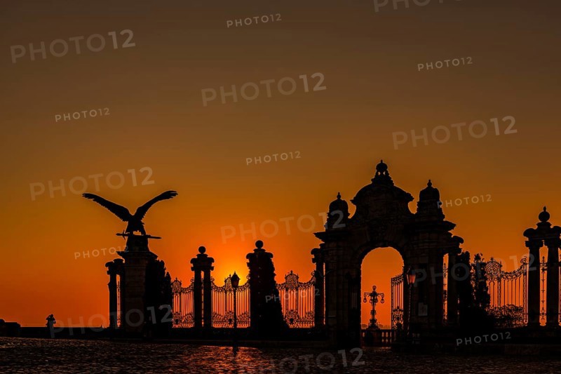 Sunrise with statue of the mythical Hungarian eagle