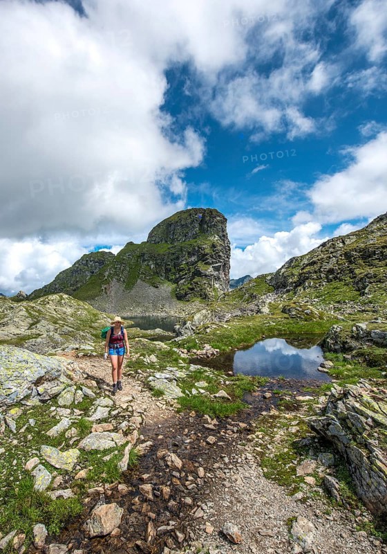 Hiker at a small lake