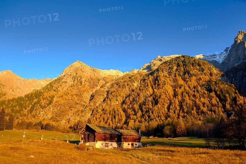 Mountain landscape with hut in autumn
