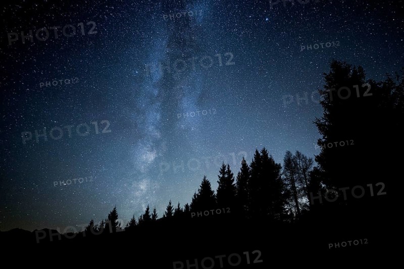 Milky Way over the mountains and forest at Schwagalp