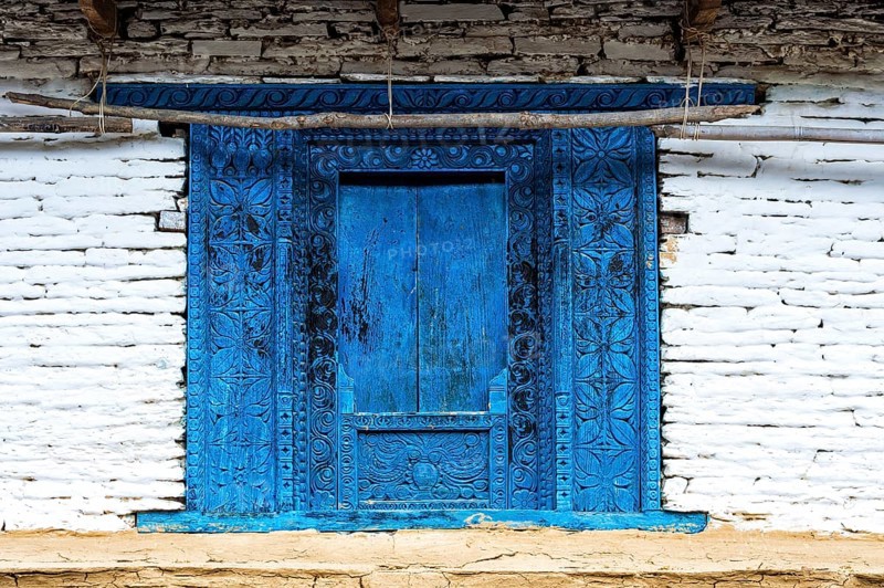 Blue old wooden carved door