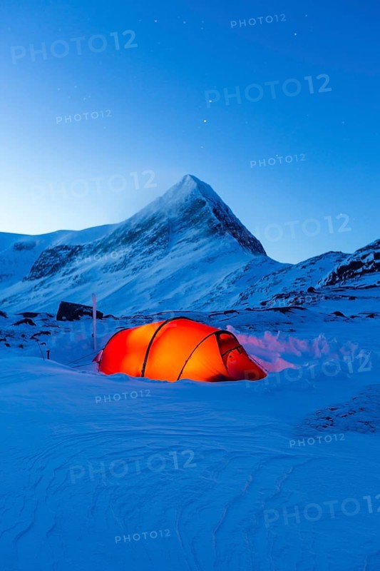 Tent with person in the snow