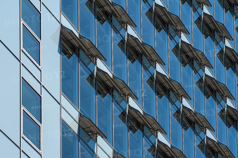 Ventilation flaps on windows in skyscraper facade