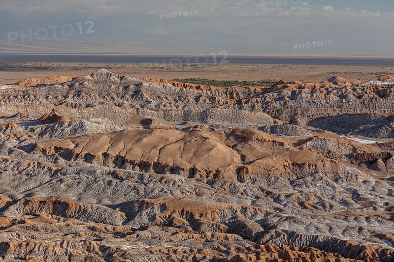 Bizarre red rock formations with white salt