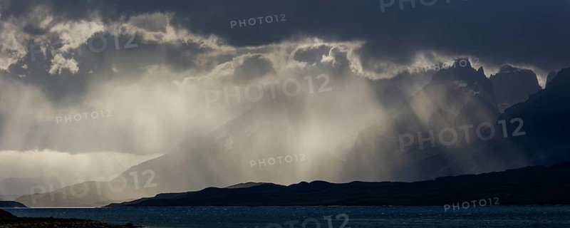 Glacial lake Sarmiento de Gamboa with the Cordillera del Paine mountain group in the evening light
