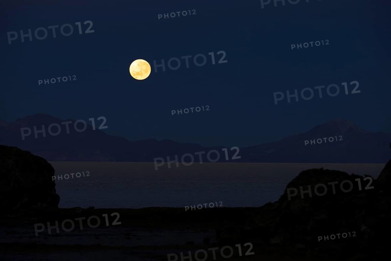 Full moon setting at dawn