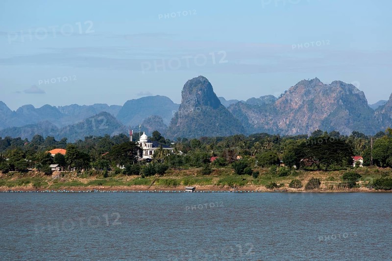 View over the border river Mekong to karst mountains in Laos