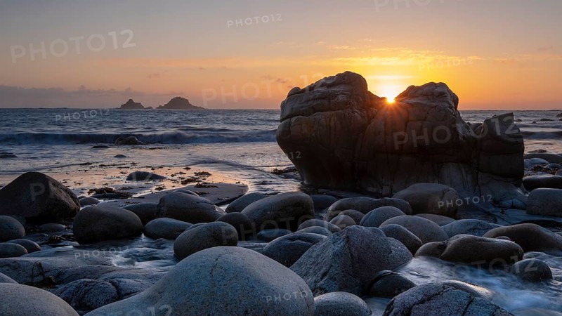 Stony coast at sunset