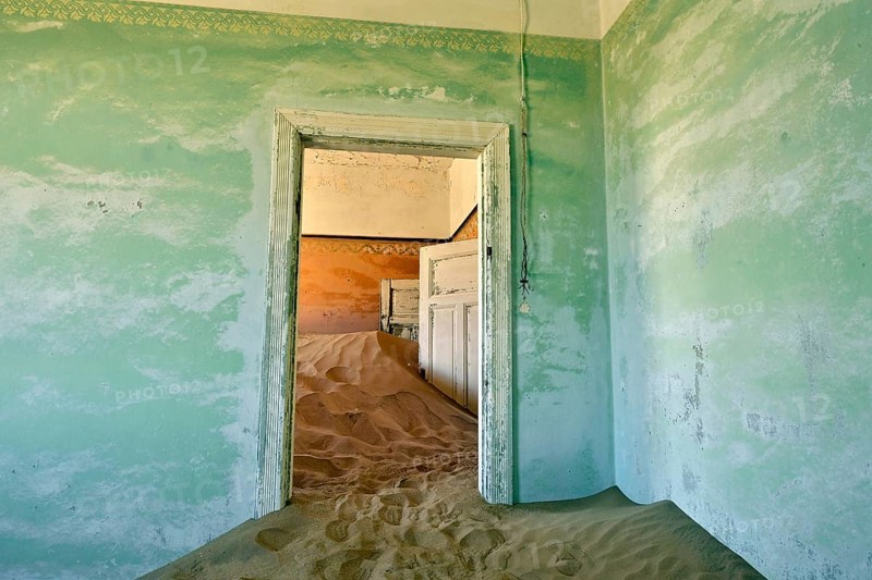 Desert sand in the ruined building of the former diamond city