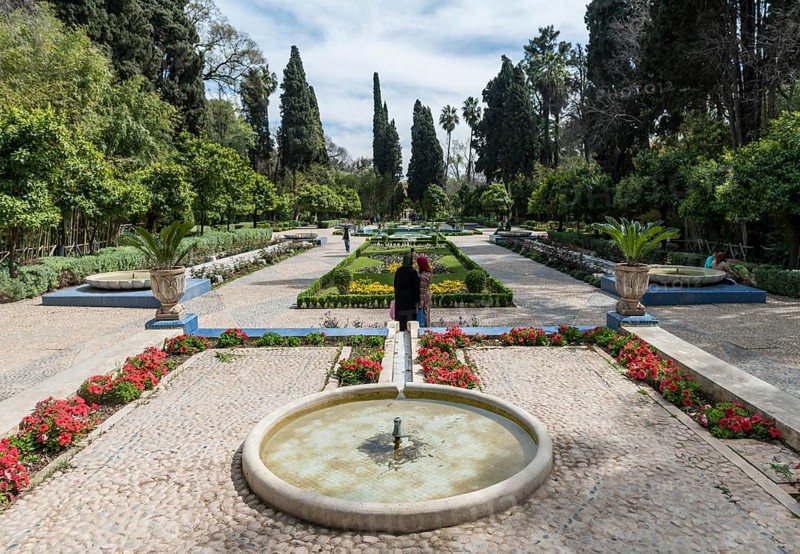 City park with fountain and flowers