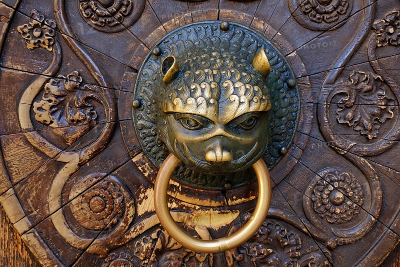 Lowenkopf as door knocker at the south portal
