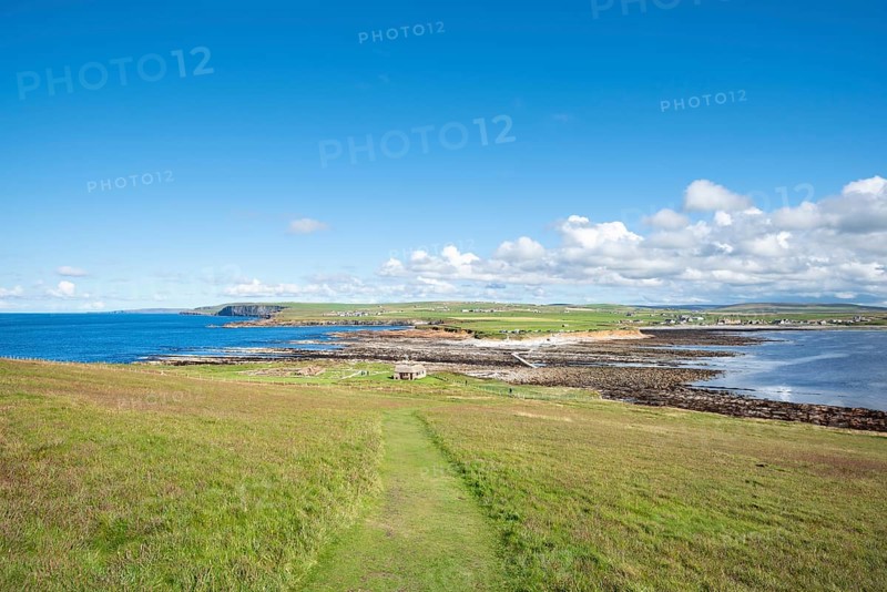 View from the tidal island Brough of Birsay to the island Orkney-Mainland