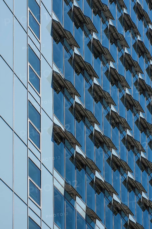 Ventilation flaps on windows in skyscraper facade
