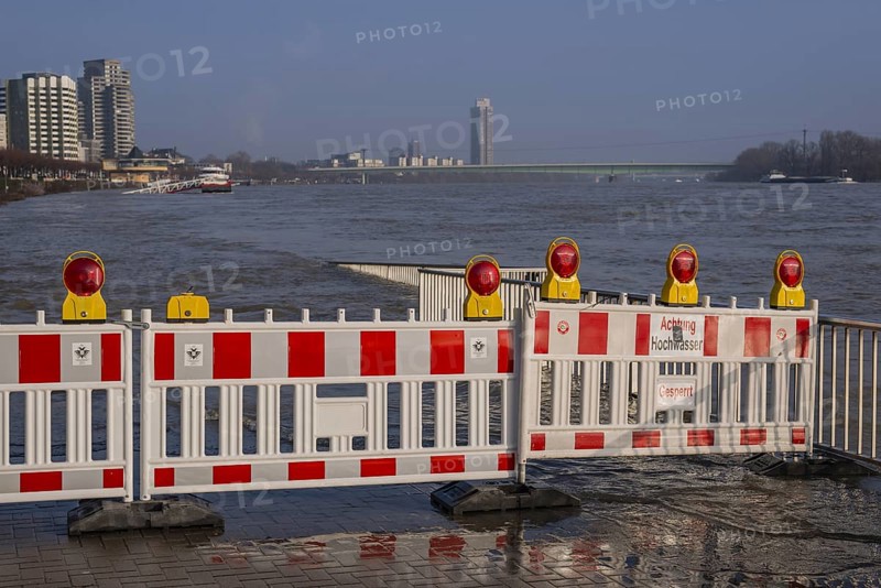 Barrier at a ship landing stage on the Rhine during flood