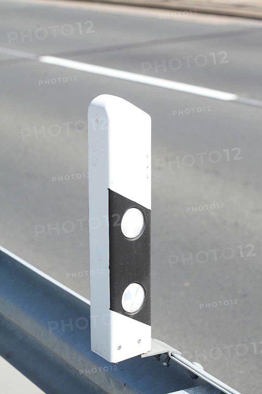 Road bounding post at guard rail