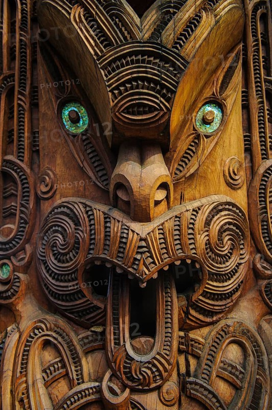 Traditional wood carved mask in the Te Puia Maori Cultural Center