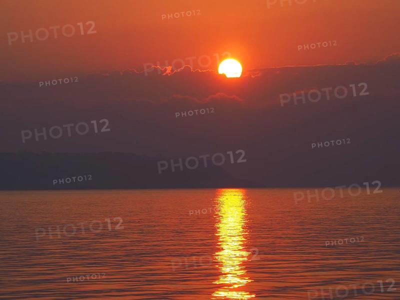 Sunrise over the sea in front of Ischia Ponte