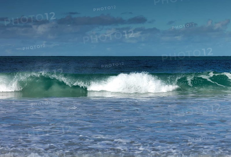 Breaking waves on the beach