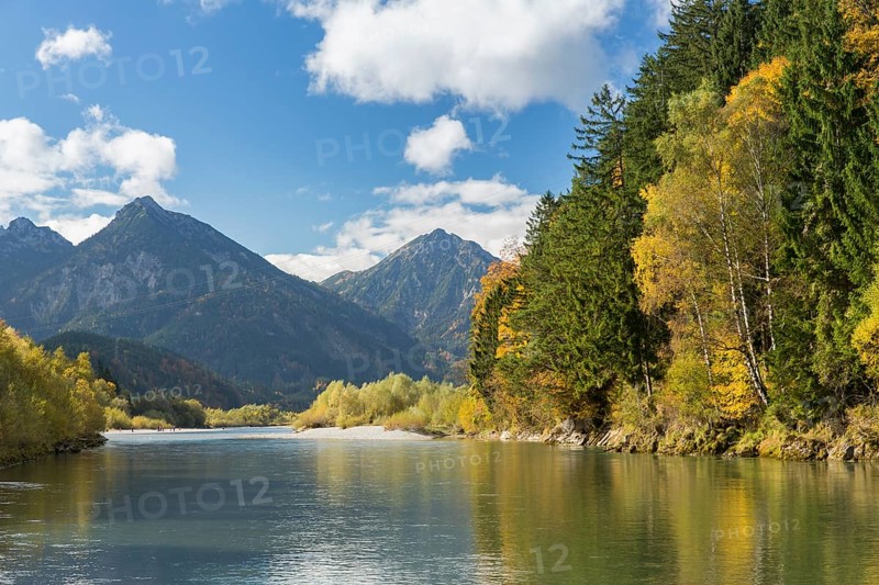 The river Lech with autumnal forest near the Ziegelwiesen