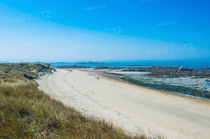 Overlook over a sand beach at the north coast of Herm