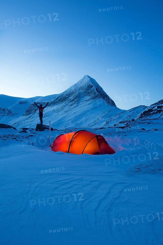 Tent with person in the snow