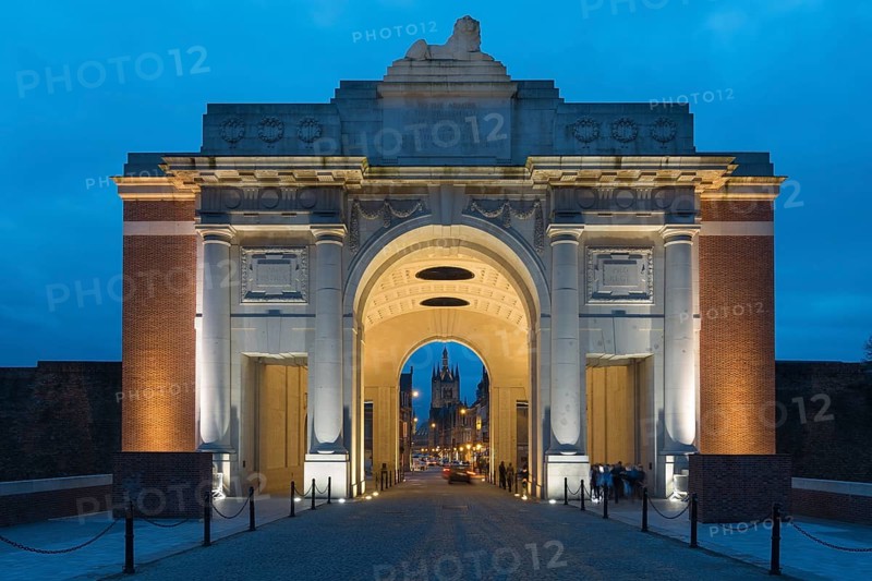 Illuminated Menin Gate at dawn